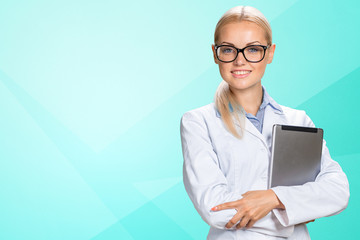 Wall Mural - Smiling medical woman doctor