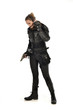 © faestock - full length portrait of female  soldier wearing black  tactical armour, holding a gun, isolated on white studio background.