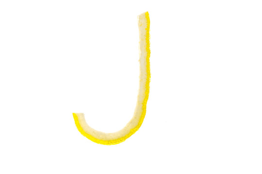 Letters of english alphabet from citron of lemon isolated on white background. J