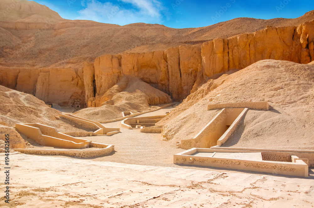 Valley of kings. The tombs of the pharaohs. Tutankhamun. Luxor. Egypt. Ancient monument of architecture. Museum. Excavation. Vacation holidays background wallpaper - obrazy, fototapety, plakaty 