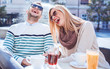 © bobex73 - Romantic couple drinking coffee and juice, having a date in the cafe. Dating, love, relationships