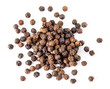 Black pepper. Heap of peppercorns isolated on white background. Macro. Top view.