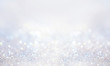 canvas print picture - Glitter background in pastel delicate silver and white tones de-focused.