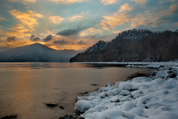 Wall Mural - Russia. Mountain Altai. Sunset on lake Teletskoye.