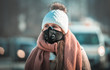 © leszekglasner - Young woman wearing protective mask in the city street, smog and air pollution