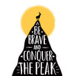 Vector illustration with goat silhouette on the top of the mountain peak. Be brave and conquer the peak lettering quote.