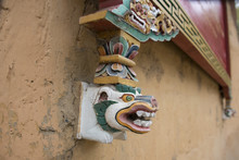 Bhutan, Thimphu. Detail Of Traditional Bhutanese Architecture, Ornately Carved Wall Decoration.