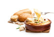 Delicious  hot baked camembert with sultanas isolated on white