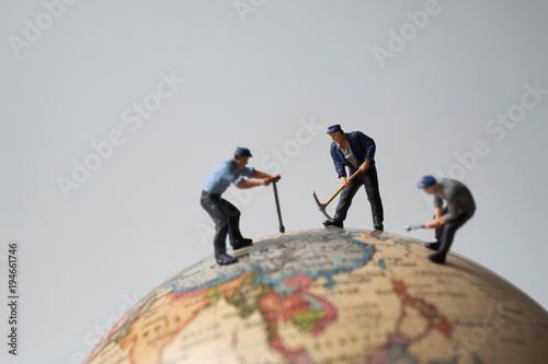 地球儀とミニチュア人形の作業員 Buy This Stock Photo And Explore Similar Images At Adobe Stock Adobe Stock