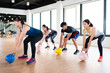 © PR Image Factory - team of fitness player exercise with kettlebell