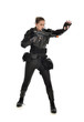 © faestock - full length portrait of female  soldier wearing black  tactical armour, holding a rifle gun, isolated on white studio background.