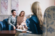 © BestForYou - Beautiful and happy young couple visiting psychologist for relationship counselling.