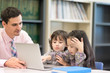 © Nattanon - Happy Children and Teacher in Learning Class at Library. Setup studio shooting.