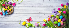 Easter Background. Colorful Spring Tulips With Butterflies And Painted Eggs