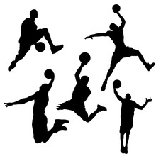 Black Silhouettes Of A Basketball Player On A White Background
