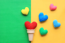 Colorful Of Handmade Crochet Heart In Waffle Cup On Yellow And Green Background For Valentines Day