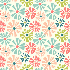 Spring theme seamless pattern of cut out style daisies. Cheerful retro design for fabric, wallpaper, backgrounds and decor.