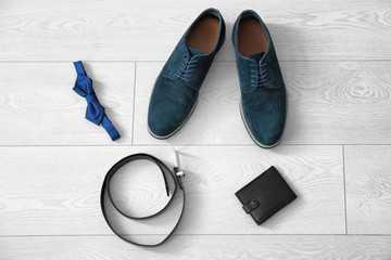 Canvas Print - Composition with stylish men's  shoes on floor