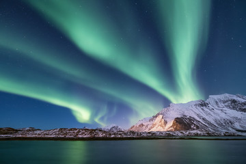 northen light under mountains. beautiful natural landscape in the norway