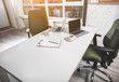 © Yakobchuk Olena - Business room. Modern empty office of skilled managers with table and chairs around it. Notebooks and coffee are on desk