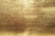 © phatthanit - Gold abstract background or texture and gradients shadow