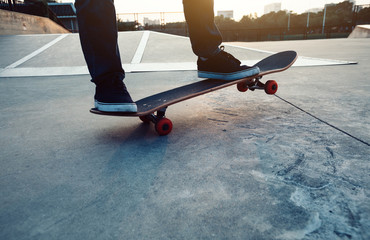 Wall Mural - skateboarder legs skateboarding on skatepark