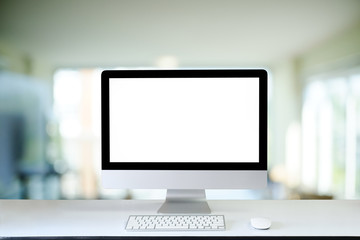 Mockup computer pec on desk with keyboard and modern mouse.