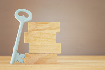 Poster - The key and wooden blocks. opportunity and chance concept.