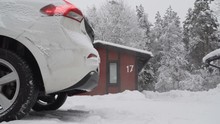 Winter Camp Atmosphere. Car And Wooden Houses,