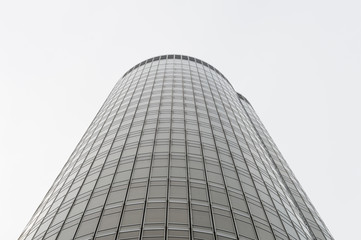 low angle view of modern skyscraper exterior and sky in modern city