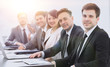 © ASDF - project Manager and professional business team sitting at Desk