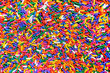 © Kevin Mayer - Rainbow sprinkles close up background