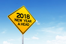 2018 New Year Road Sign Over Beautiful Sky.