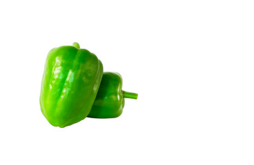 Wall Mural - Bell peppers are placed on a white background.