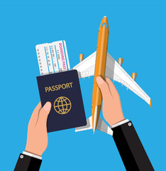 Wall Mural - Passenger jet, boarding pass and passport in hand.