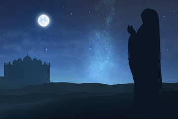 Silhouette of muslim woman raising hand and praying