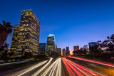 Fototapeta  - Downtown Los Angeles, skyline with trail lights, California, USA