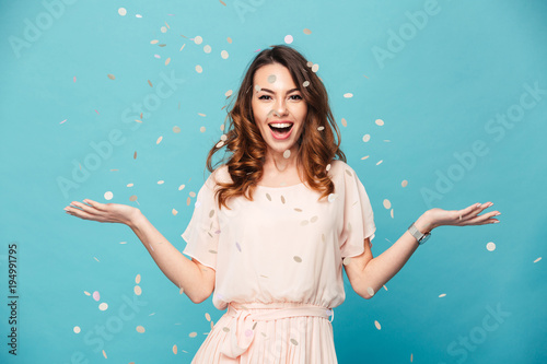 Portrait of a cheerful beautiful girl wearing dress Poster