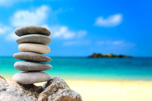 Balance Stones With Beach And Blue Sea Background For Spa Concept