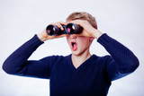 Fototapeta Młodzieżowe - Young teen boy with binoculars