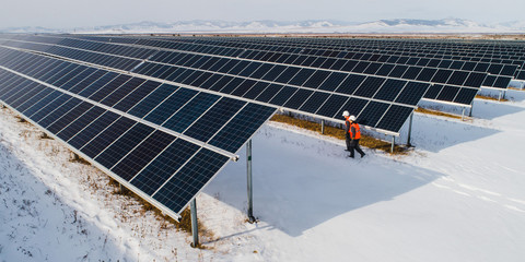 Wall Mural - solar power station worker