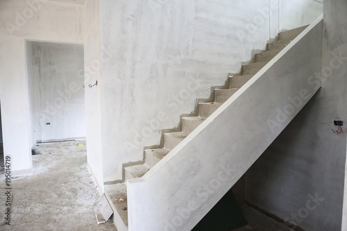 New House Construction With Concrete Staircase At Building Site New House Construction With Concrete Staircase At Building Site