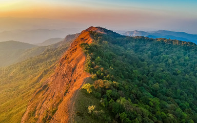 Amazing view clear sky on the top mountain with two different sky colour , only adventure traveler can see this view. Over the sky heading to the top of mountain Doi Mon Jong Chiangmai Thailand