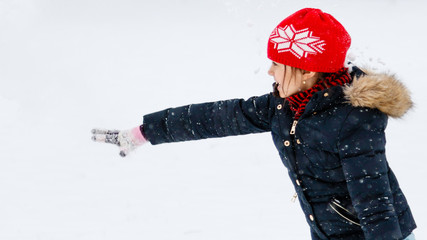 Wall Mural - girl throwing snow