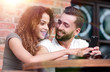 © ASDF - Beautiful couple having coffee on a date,having fun together.