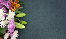 Beautiful Colorful Spring Flowers Bouquet Over Blackboard Texture Dark Background With Copy Space, Horizontal