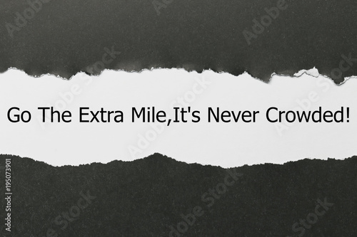 Motivational Quote Go The Extra Mile It S Never Crowded Appearing Behind Torn Paper Buy This Stock Photo And Explore Similar Images At Adobe Stock Adobe Stock