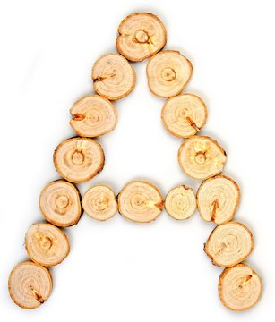 Alphabet letters made from Wood slice on white Background.A.
