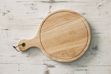 Wall Mural - Wooden chopping board on wooden background