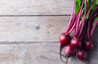 Fresh organic beet, beetroot on grey rustic wooden background. Top view. Copy space.